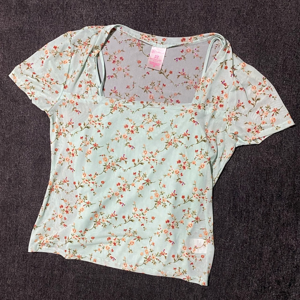 Light green see through top with green silky tank attached underneath.